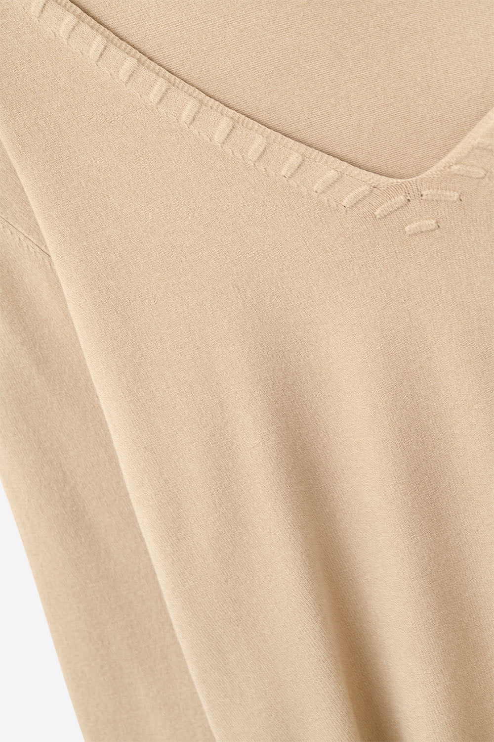 Beige sweater with V neckline
