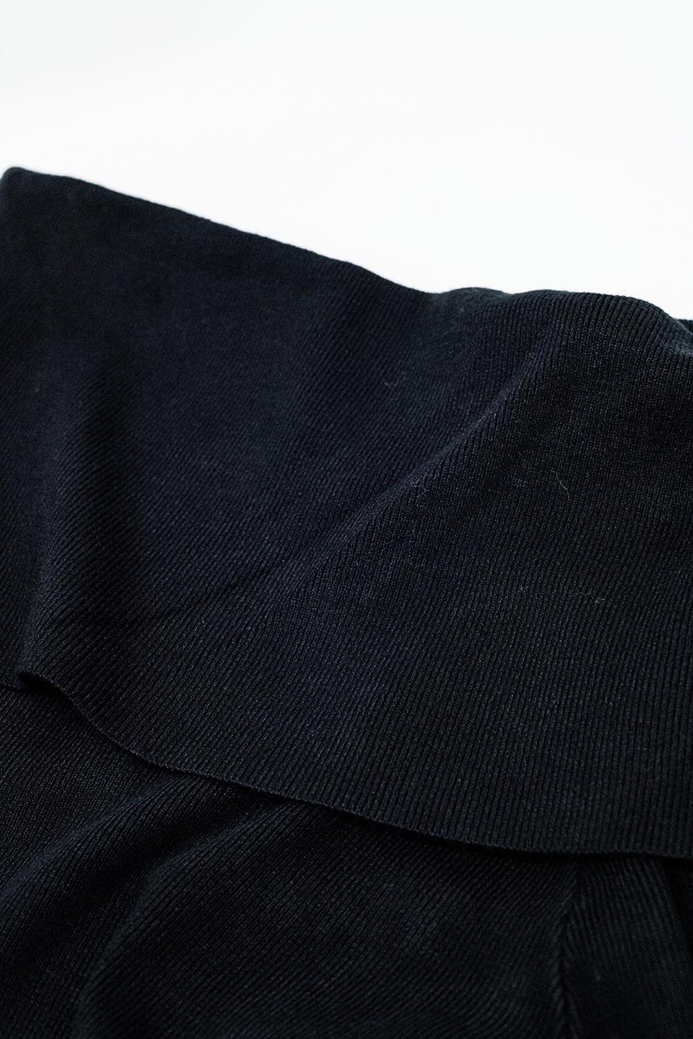 black fine knit sweater with wide boat neck