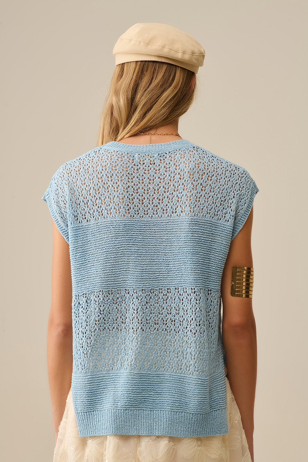 Blue sweater with soft open knit and dropped sleeves
