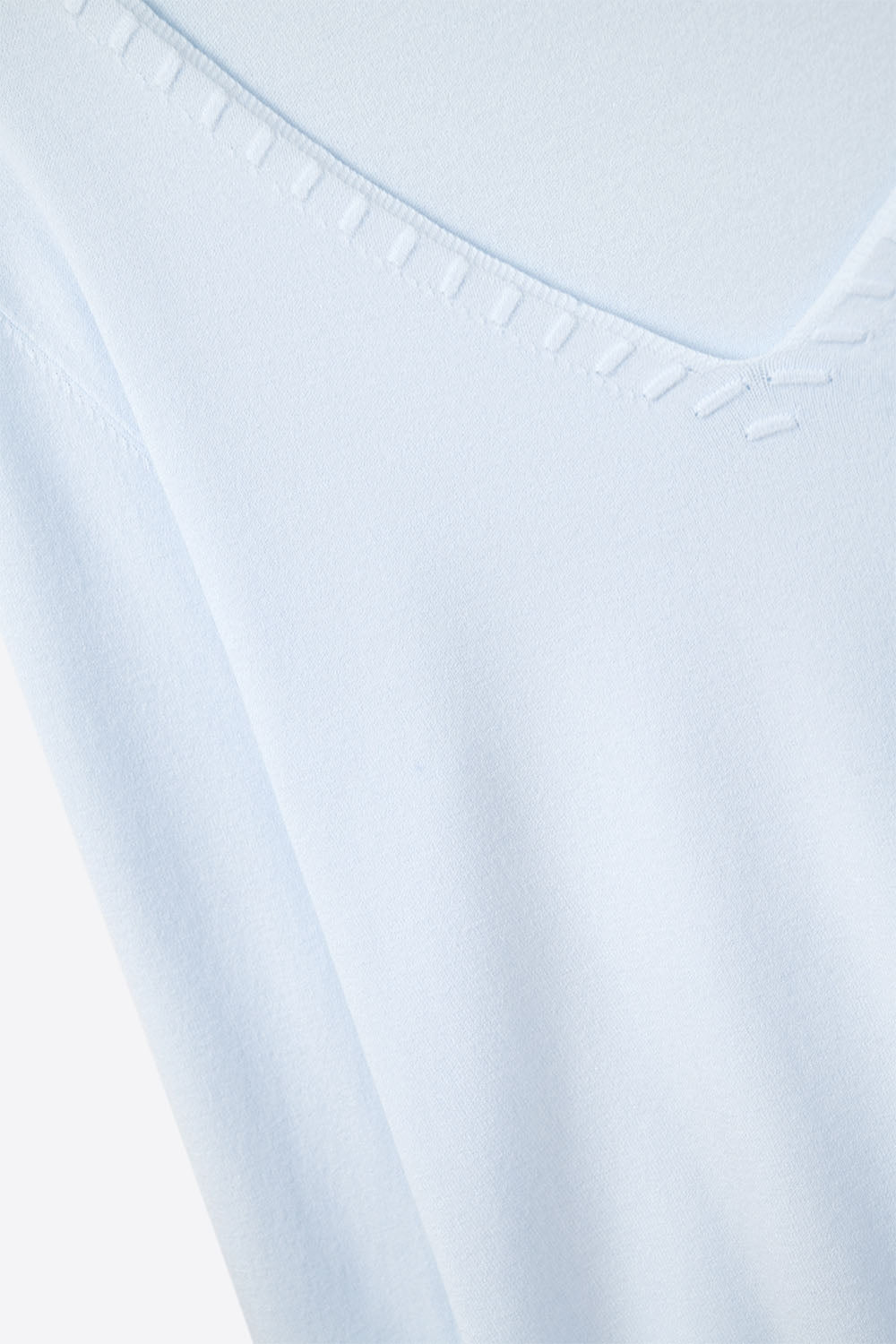 Blue sweater with V neckline