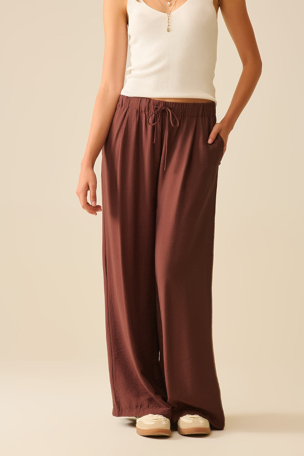 Brown pants with wide leg in light viscose fabric