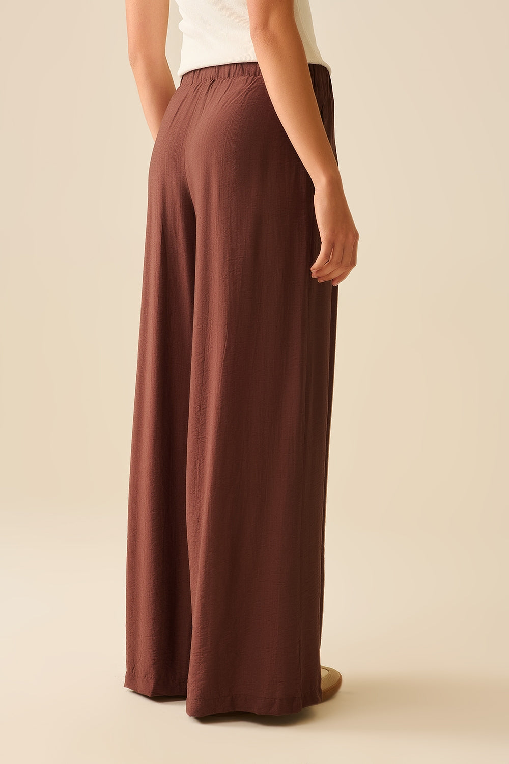 Brown pants with wide leg in light viscose fabric