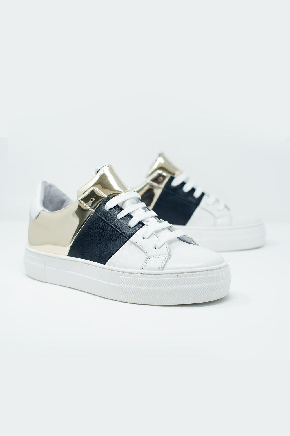 Chunky sneakers in black and gold