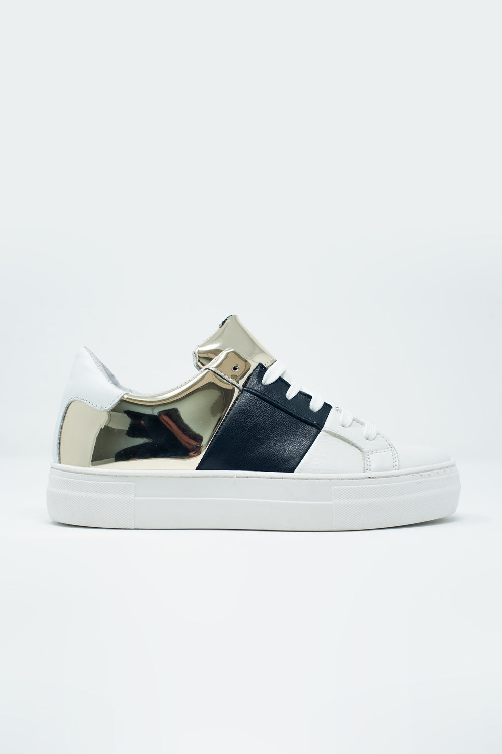 Chunky sneakers in black and gold