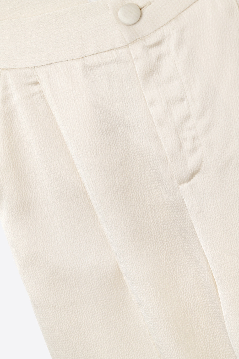 cream wide leg pants in textured satin