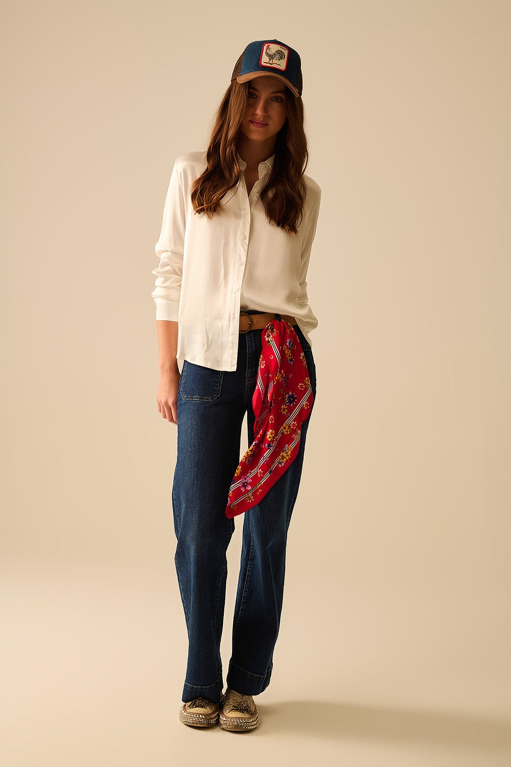 Dark wash jeans with wide leg and pockets