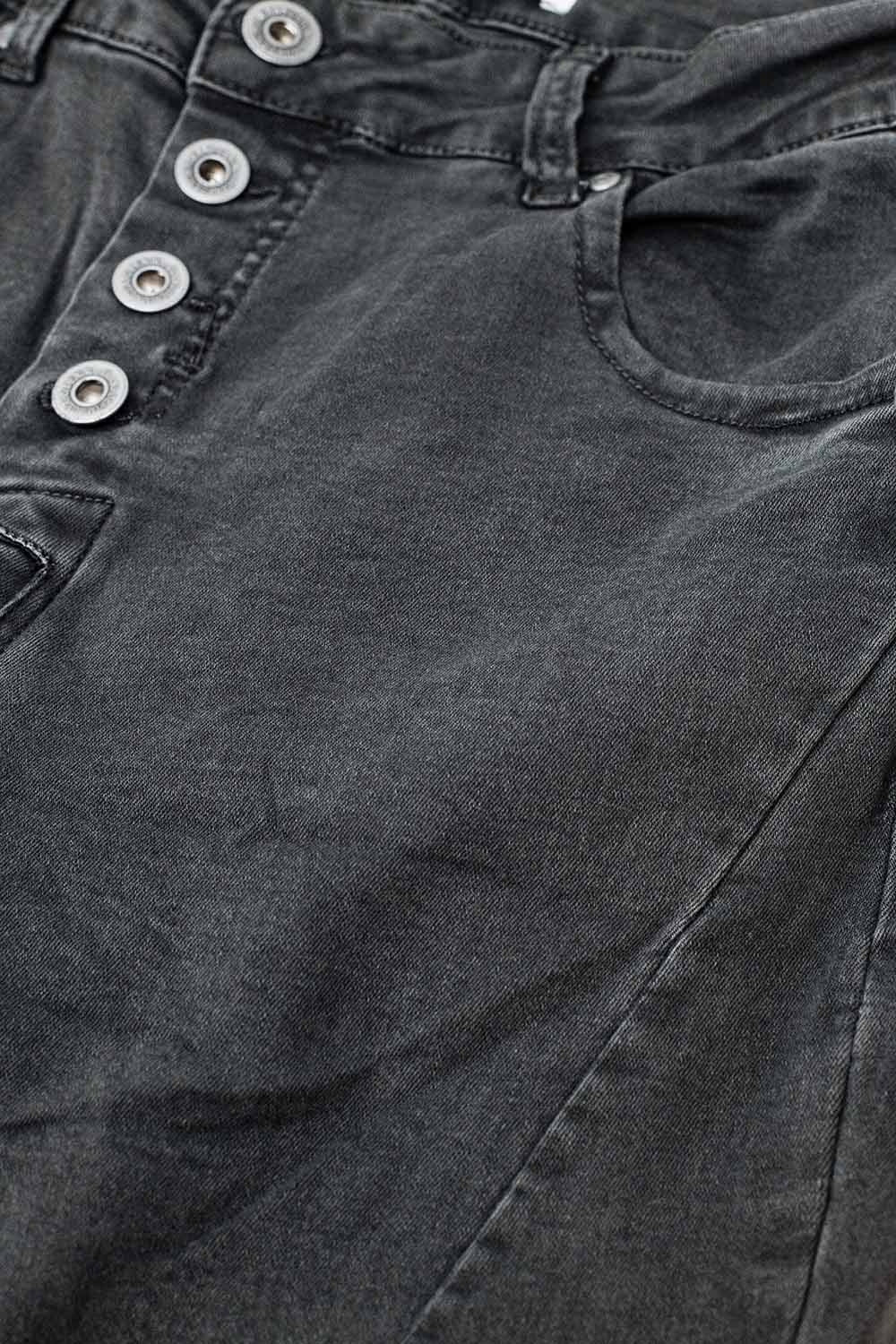 Exposed buttons skinny jeans in dark grey