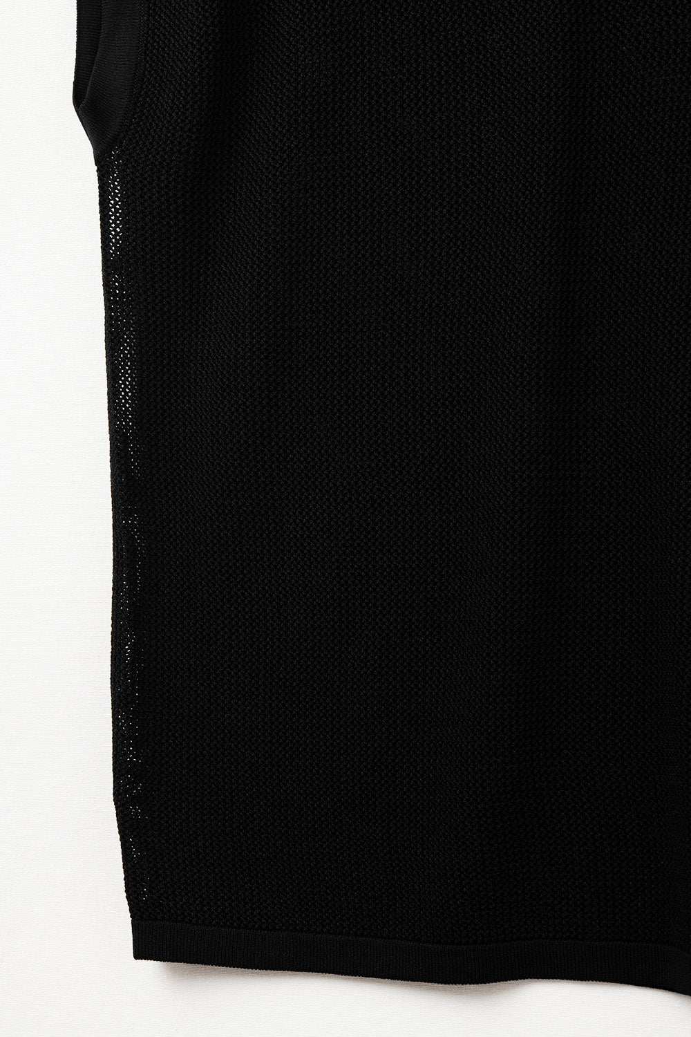 grid knit sweater in black color