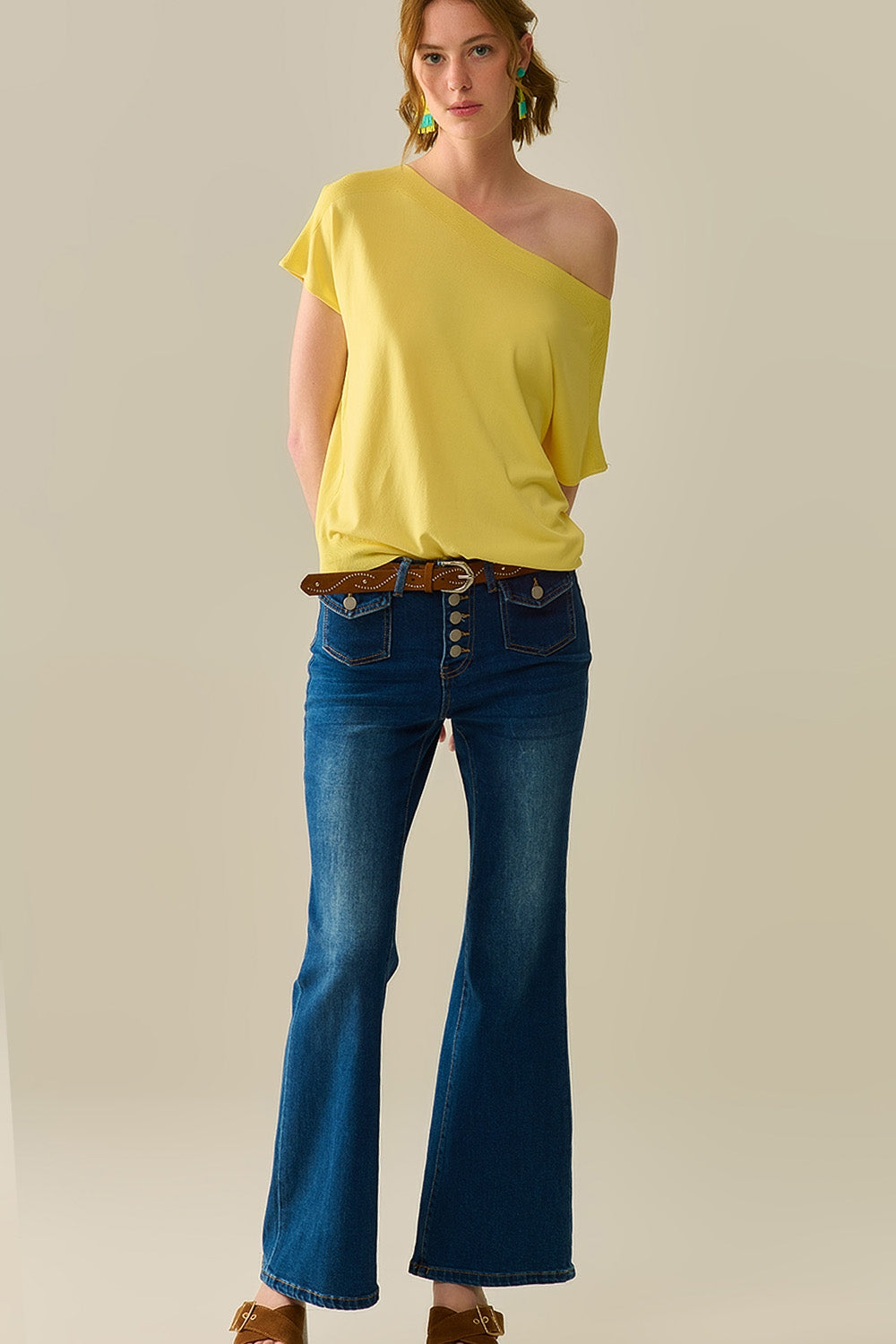 medium wash flared jeans with pockets