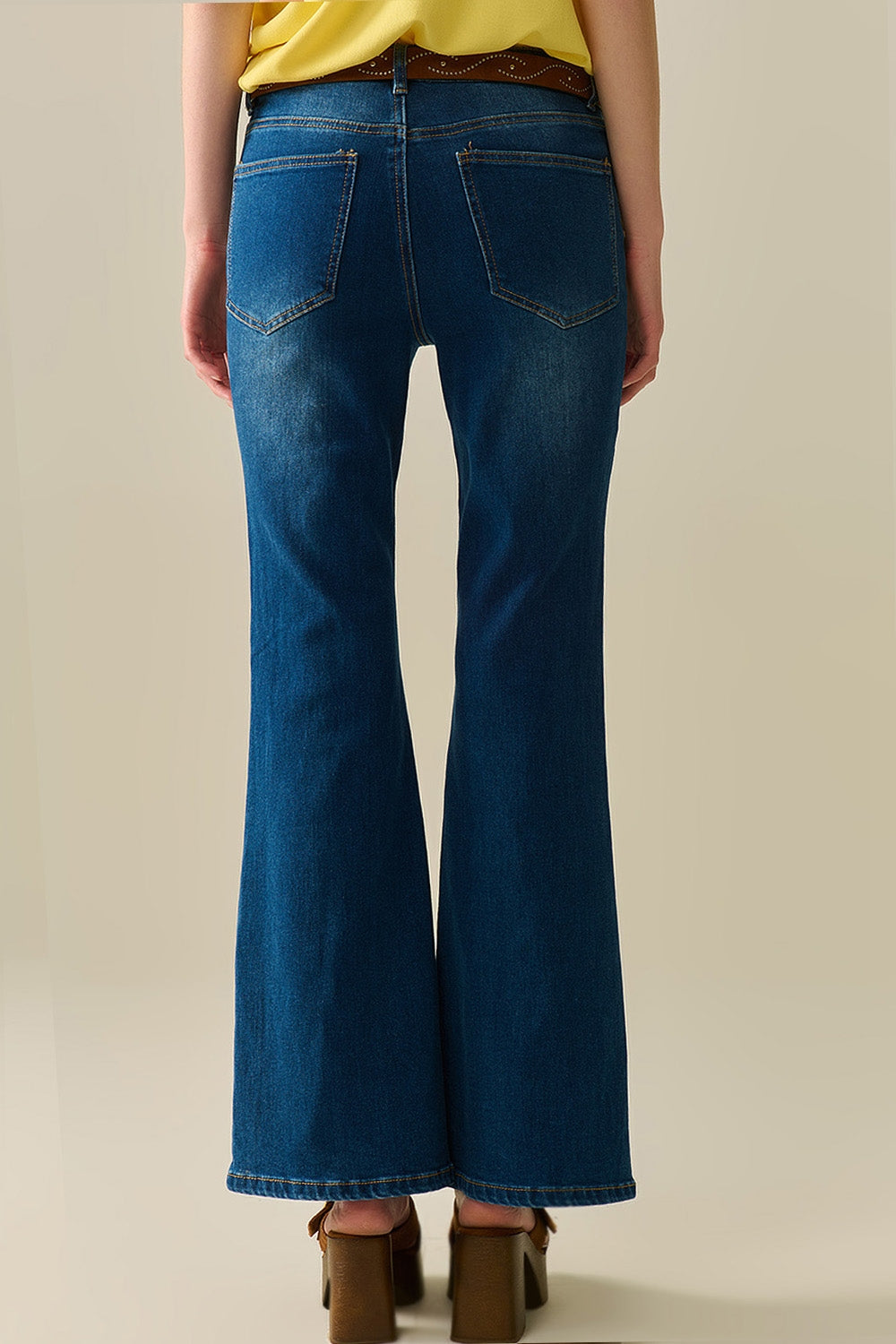 medium wash flared jeans with pockets