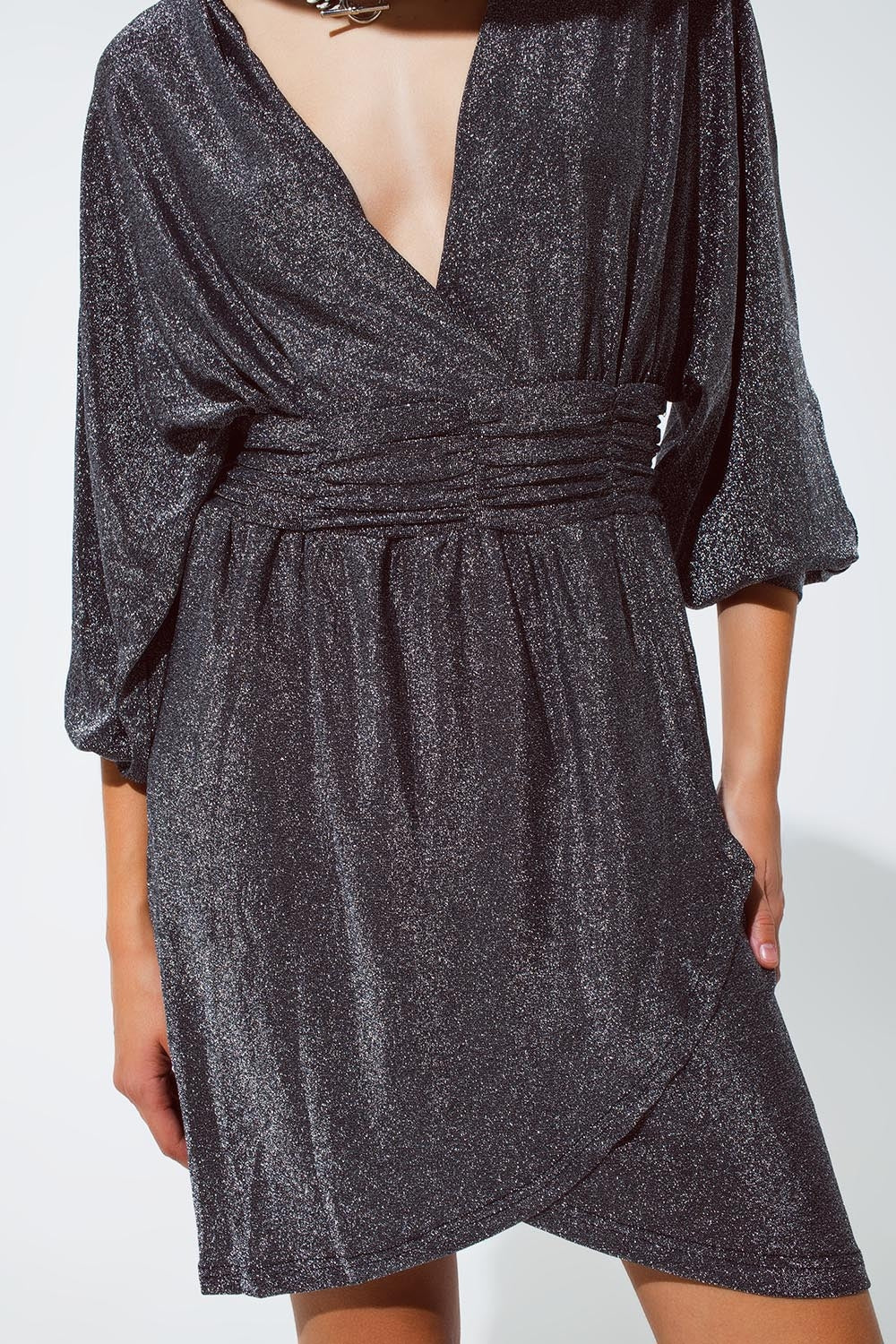 Mini length glitter dress with deep V neck in silver