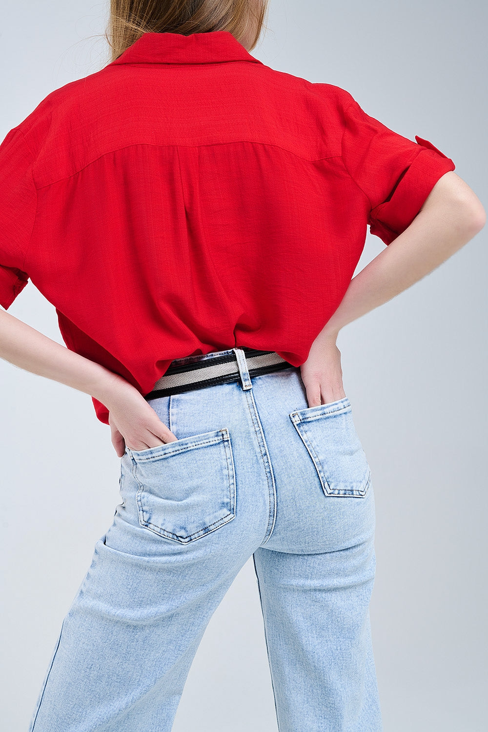 Red shirt with short sleeves and pleat on the sleeve