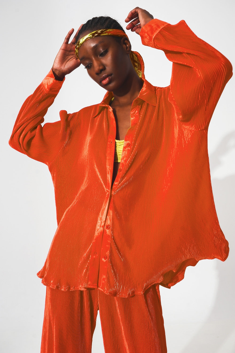 Relaxed pleated satin shirt in orange