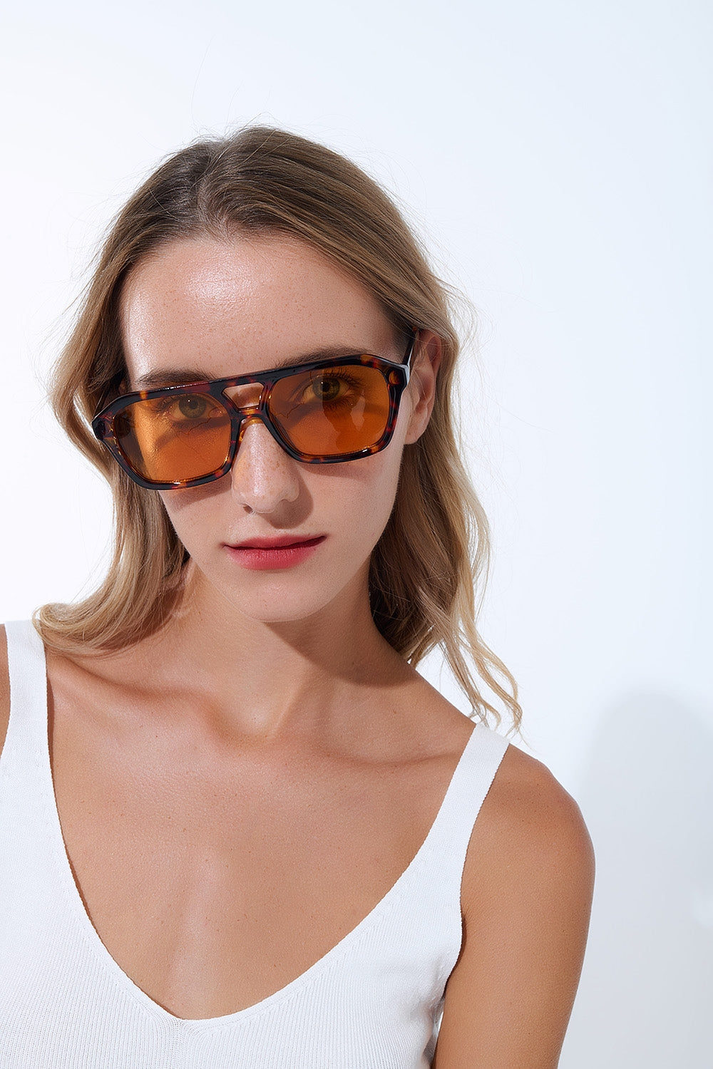 Retro Style Sunglasses with brown Tortoise Shell frames and orange lenses