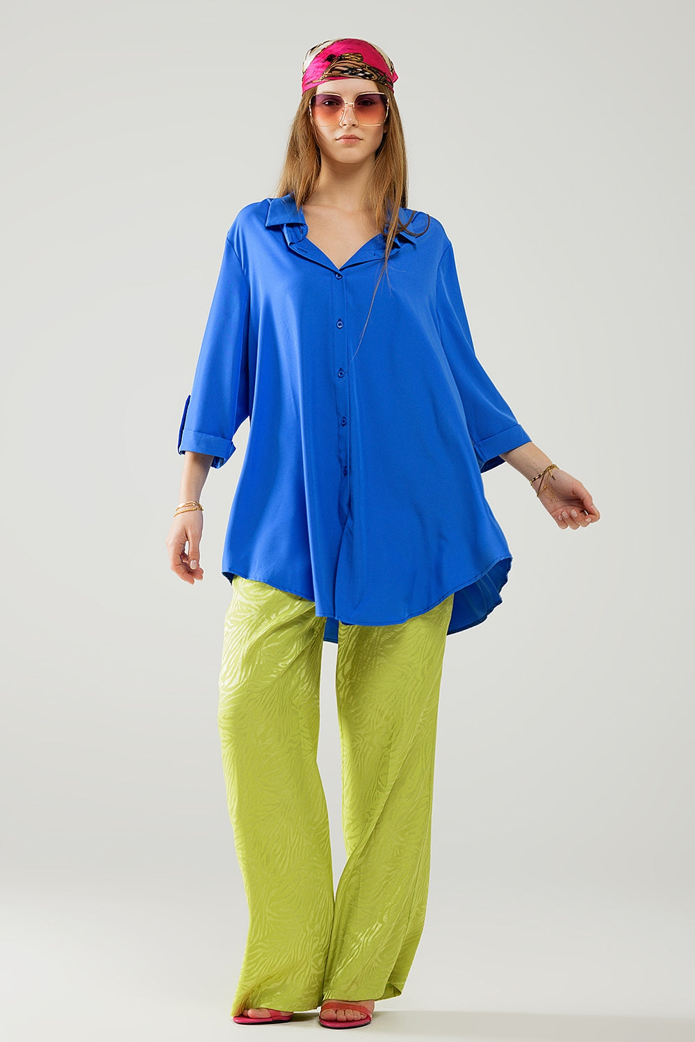 Shirt made of very soft and lightweight fabric in electric blue color.