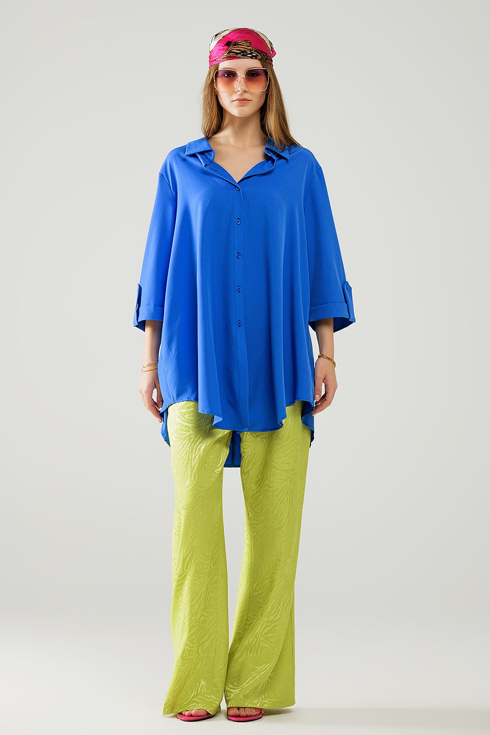 Shirt made of very soft and lightweight fabric in electric blue color.