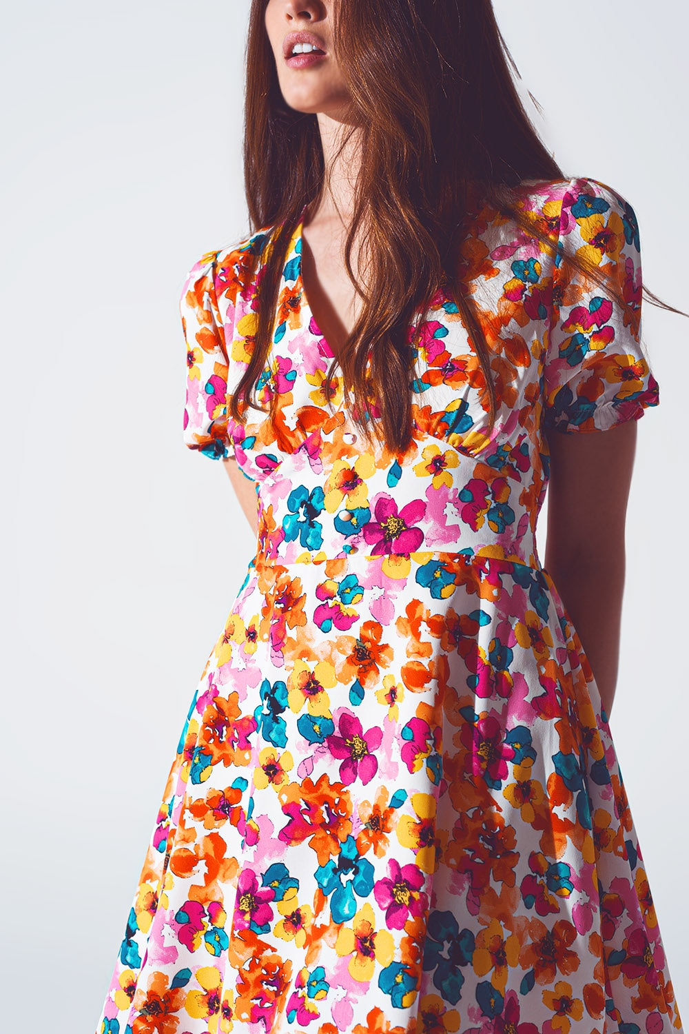 Short dress with cinched waist in multicolor floral print