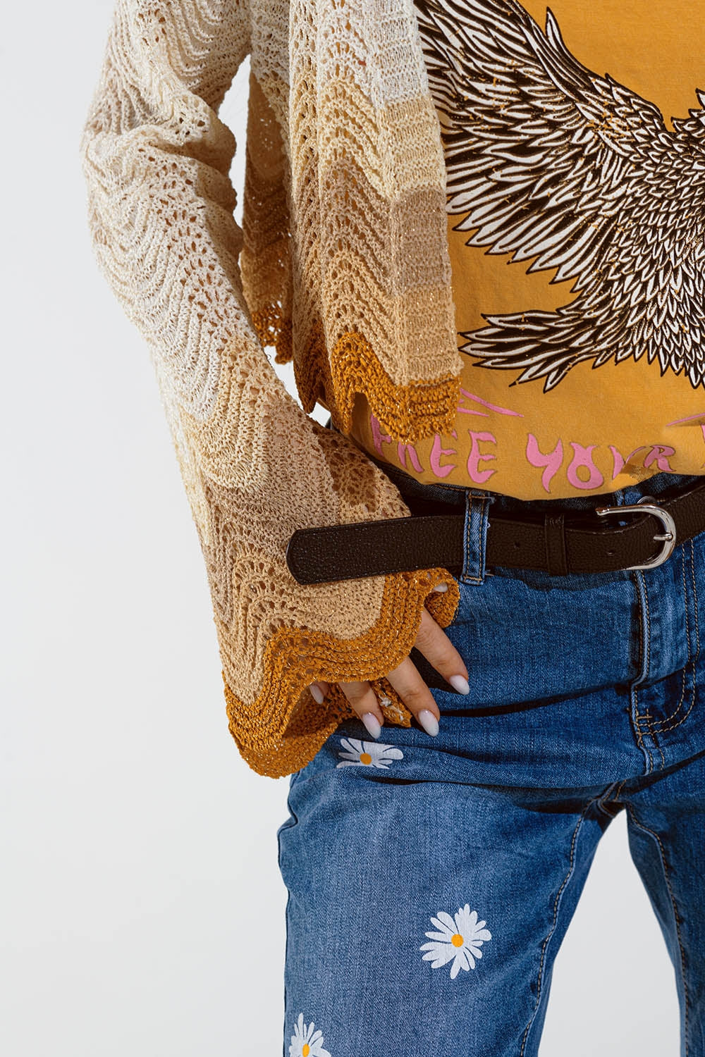 Short knitted cardigan with angel sleeves and wave multicolor detail in beige