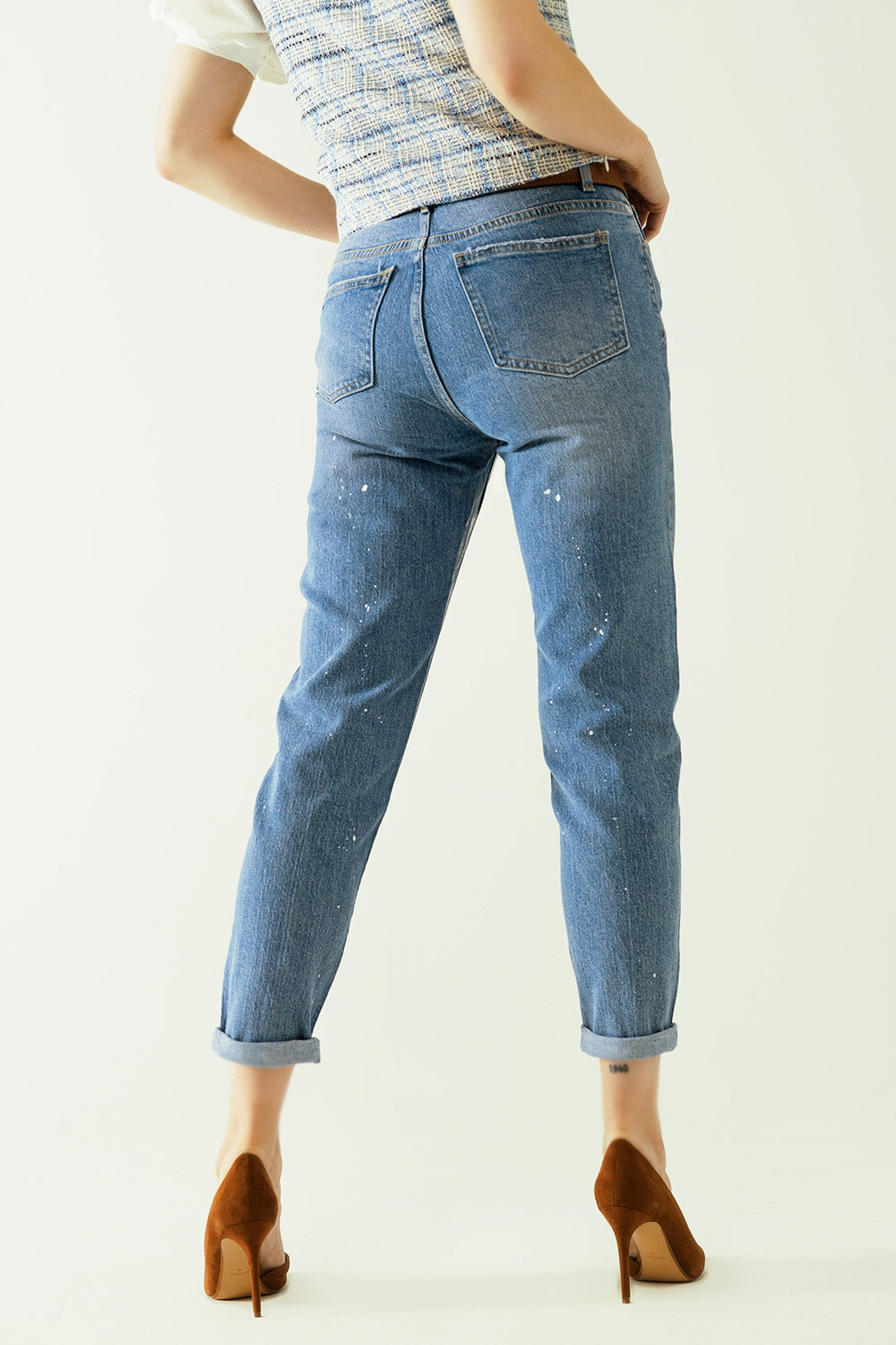 skinny blue jeans with metallic finish in light wash