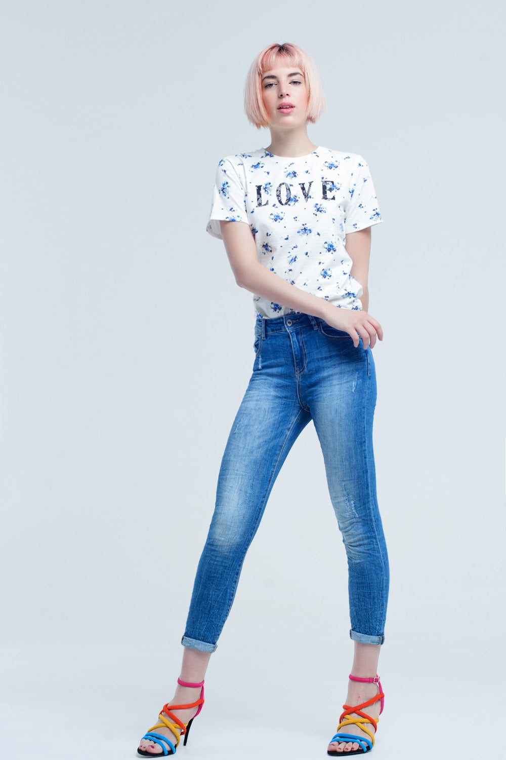 skinny jeans with worn color and wrinkles