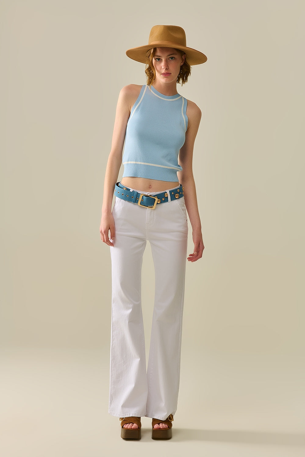 Sleeveless Sweater In Blue Featuring White Lines detail