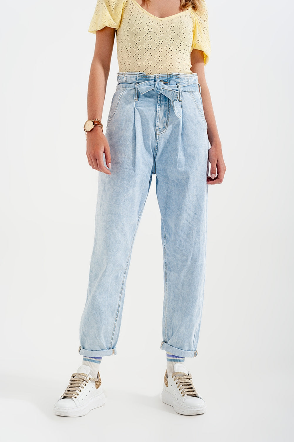 Tapered leg jeans with paper bag waist in light vintage wash
