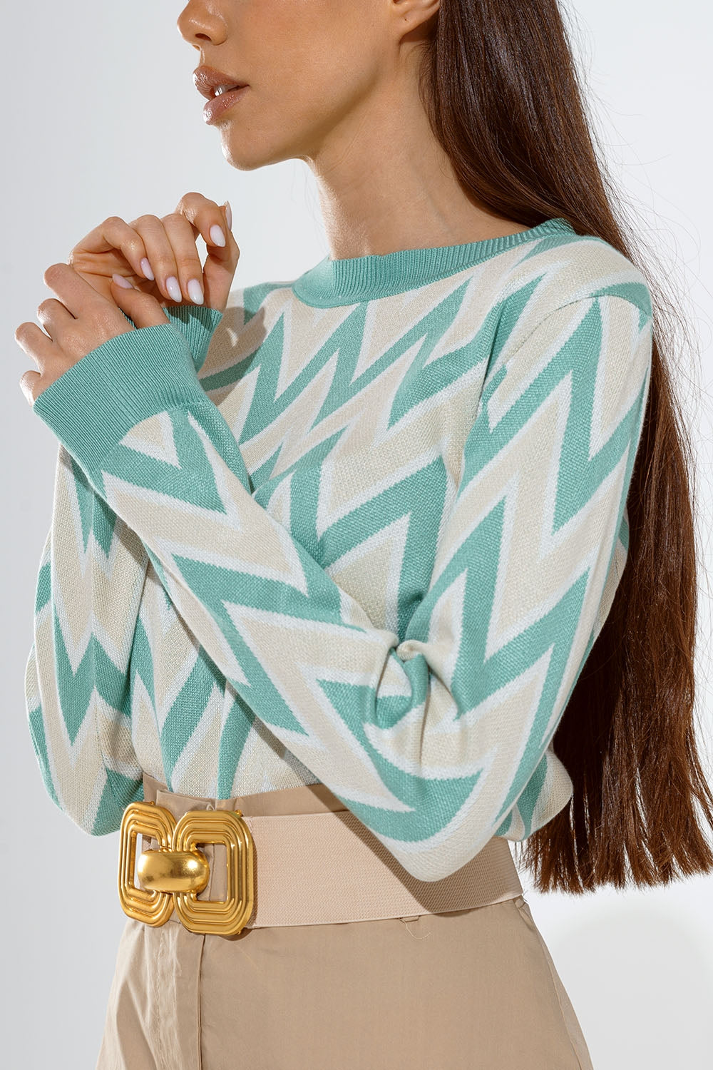 Turquoise sweater with zig zag print in Beige with white details
