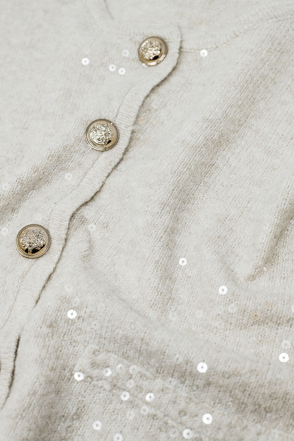 white chunky knitted cardigan with sequins