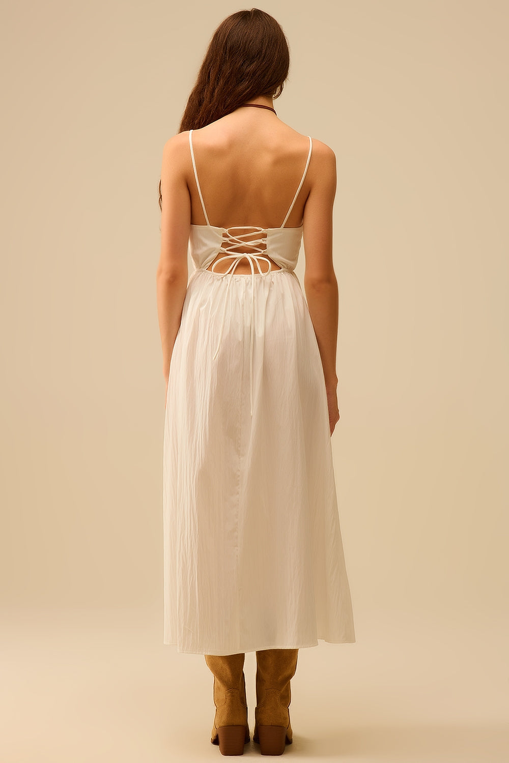 White maxi dress with embroidered palms