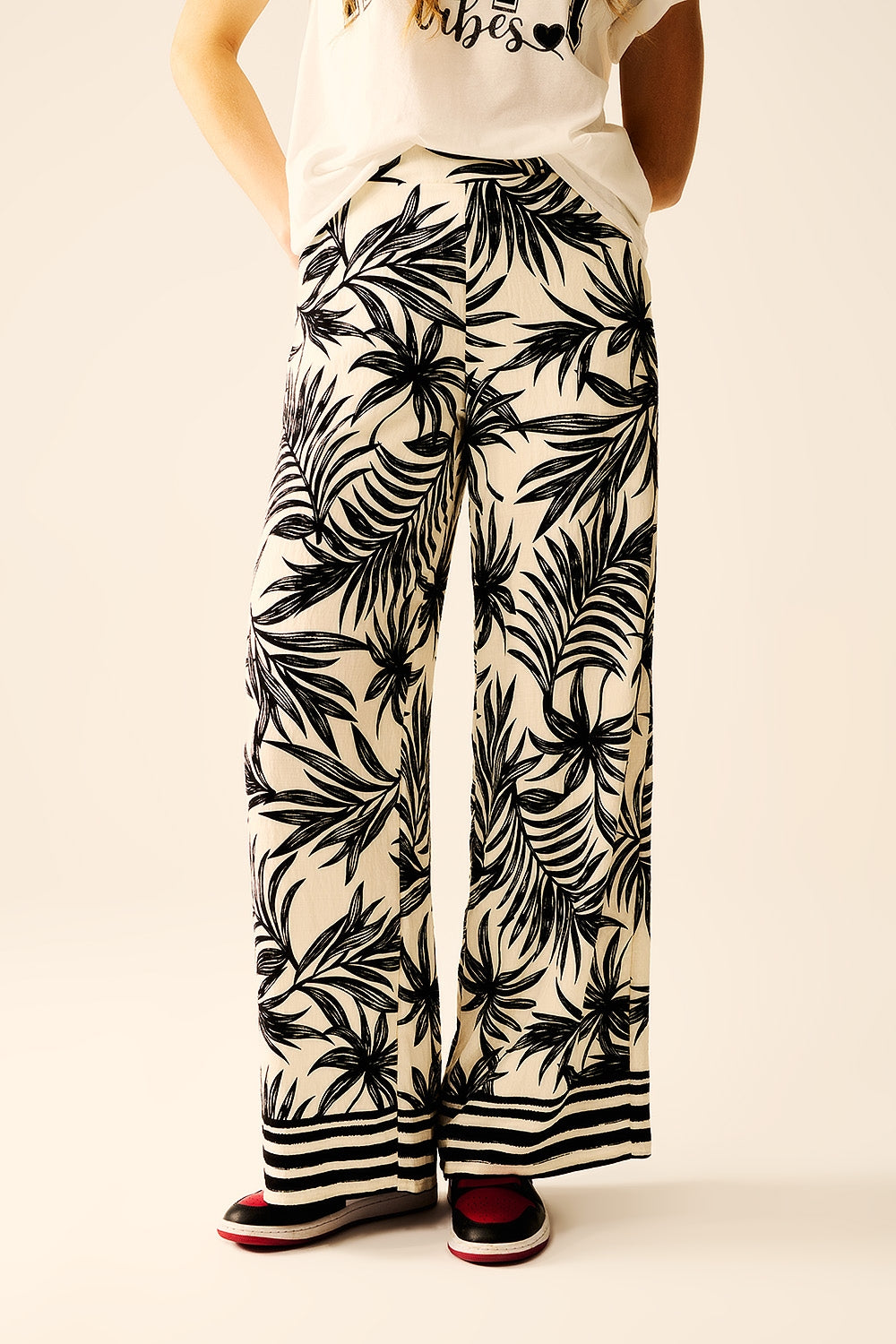 Wide Leg Pants In White With Floral Detail In Black