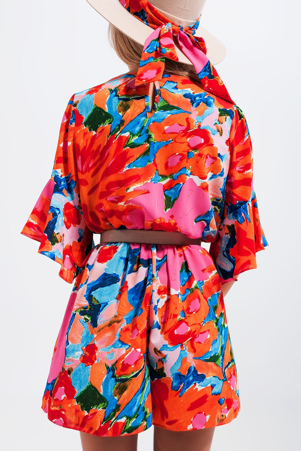 Wrap playsuit in floral
