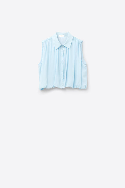 baby blue chiffon blouse with pleats at the hem