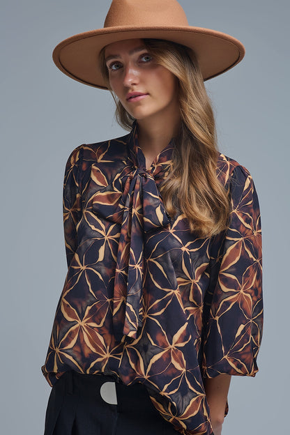 Black chiffon shirt with abstract print and knotted bow