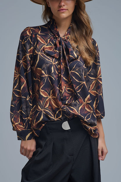 Black chiffon shirt with abstract print and knotted bow