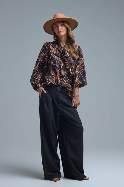 Black chiffon shirt with abstract print and knotted bow