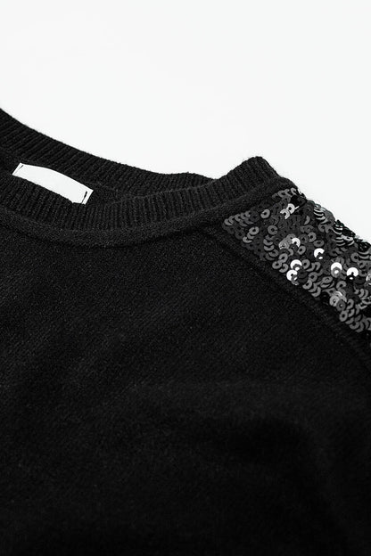 Black long sleeves sweater with sequins on the shoulders