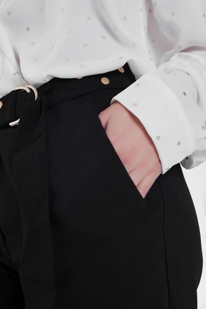 Black pants with wide legs and low hem