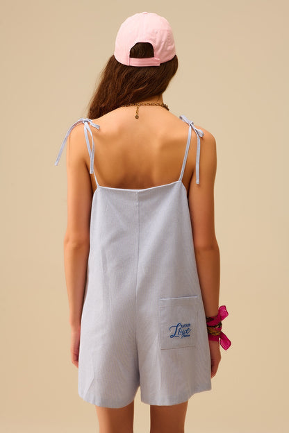 blue striped playsuit with shoulder ties and back pocket detail