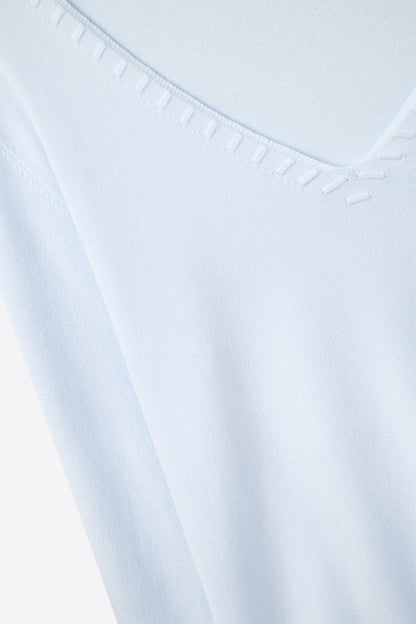 Blue sweater with V neckline