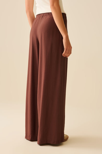 Brown pants with wide leg in light viscose fabric