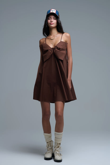 Brown poplin mini dress with a big bow detail