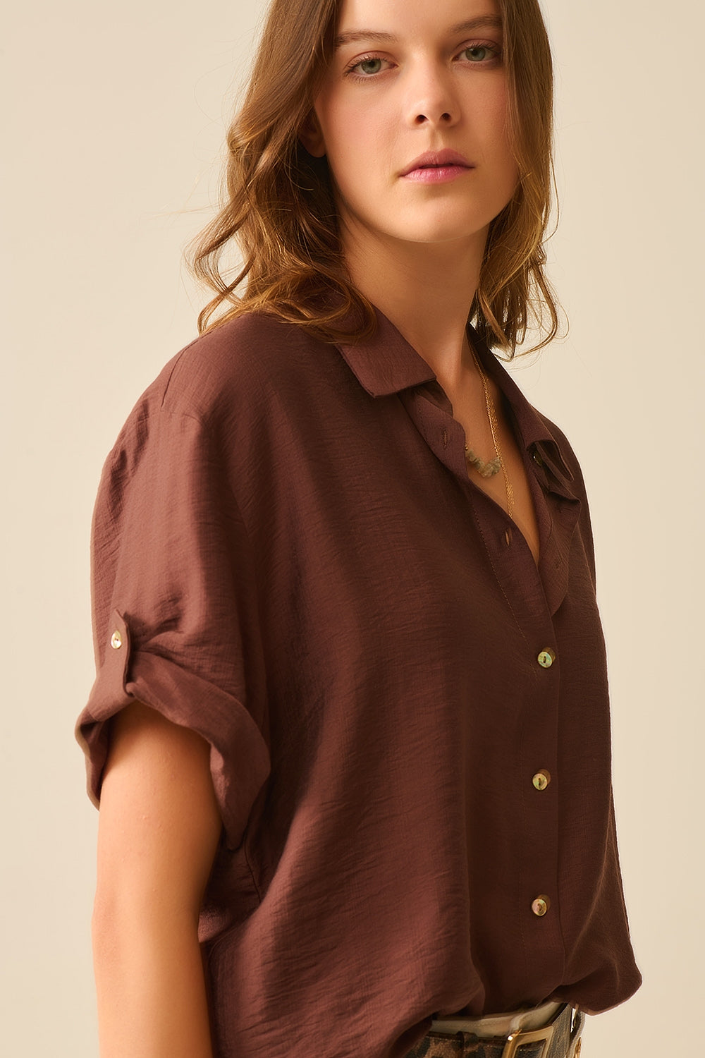 Chocolate Brown shirt with short sleeves and pleat on the sleeve