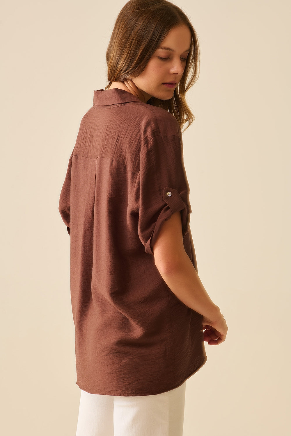 Chocolate Brown shirt with short sleeves and pleat on the sleeve