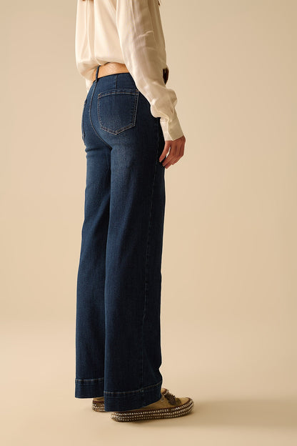 Dark wash jeans with wide leg and pockets