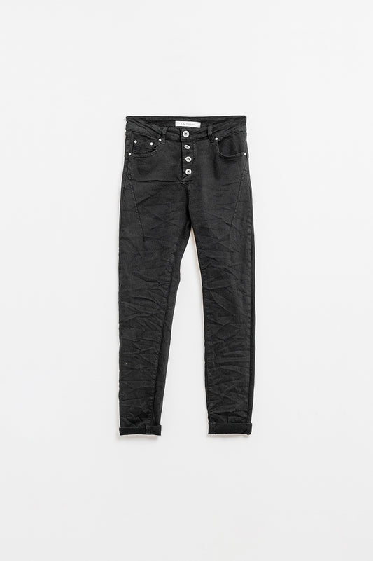 Q2 Exposed buttons skinny jeans in black
