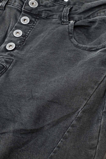 Exposed buttons skinny jeans in dark grey