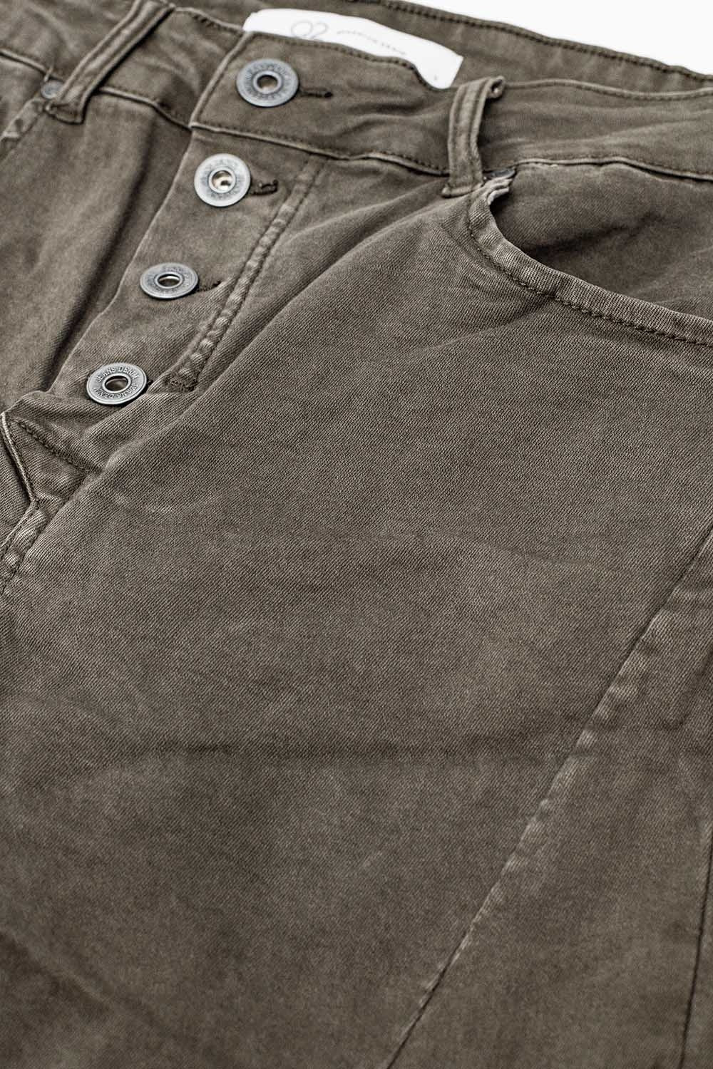 Exposed buttons skinny jeans in gray