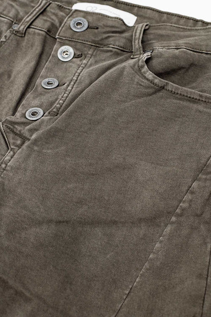 Exposed buttons skinny jeans in gray