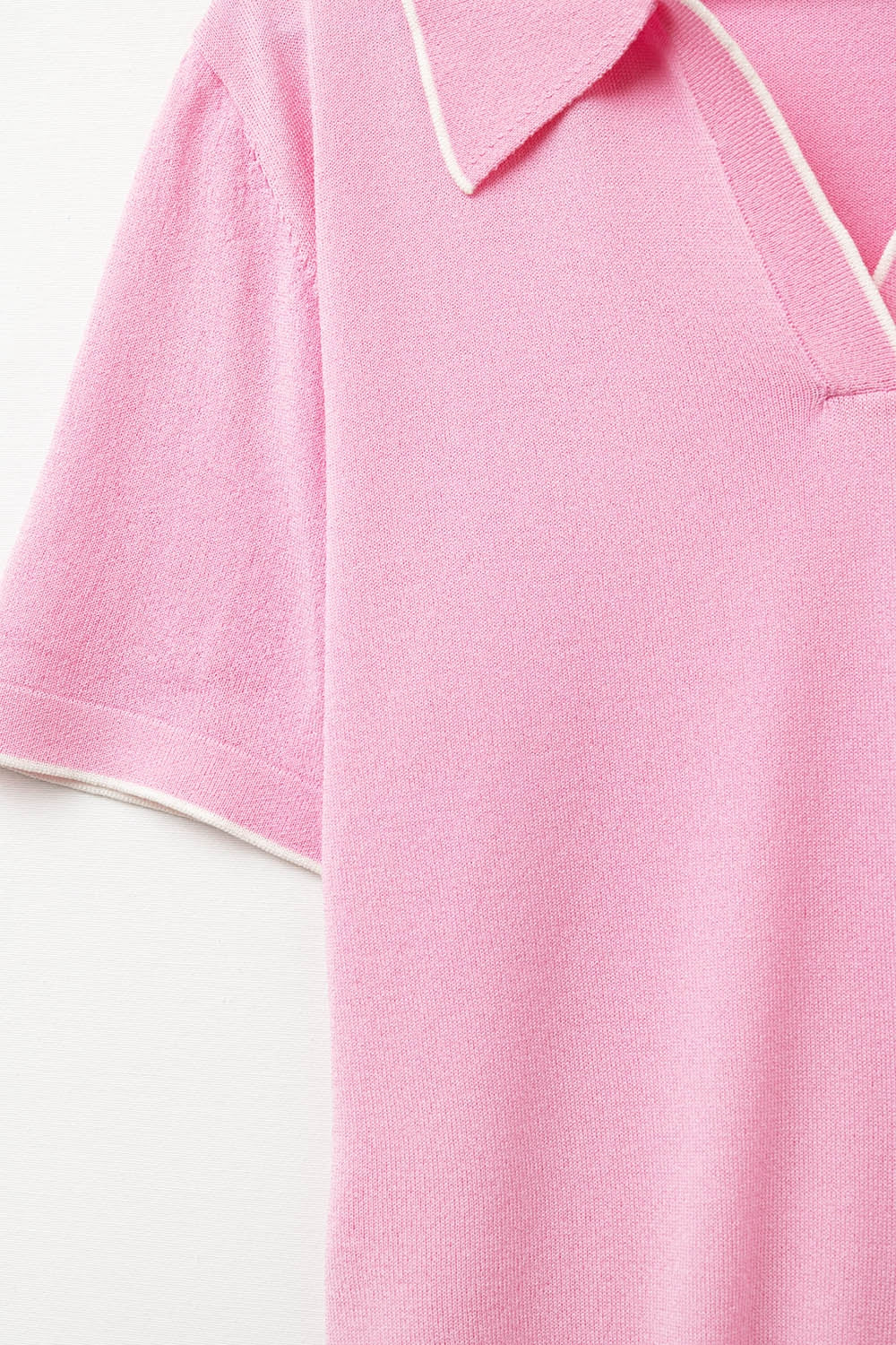 fuchsia knit polo shirt with contrasting detail