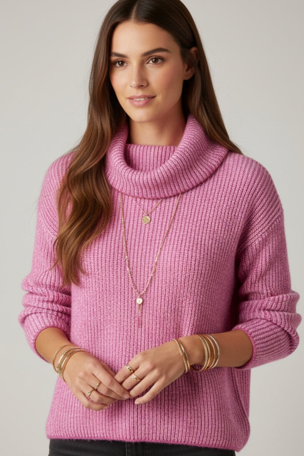 fuchsia ribbed knit sweater with a roll neck